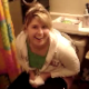 A girl has just finished shitting in the bathroom when her friend starts recording. She wipes her ass and shows us the dirty toilet paper.